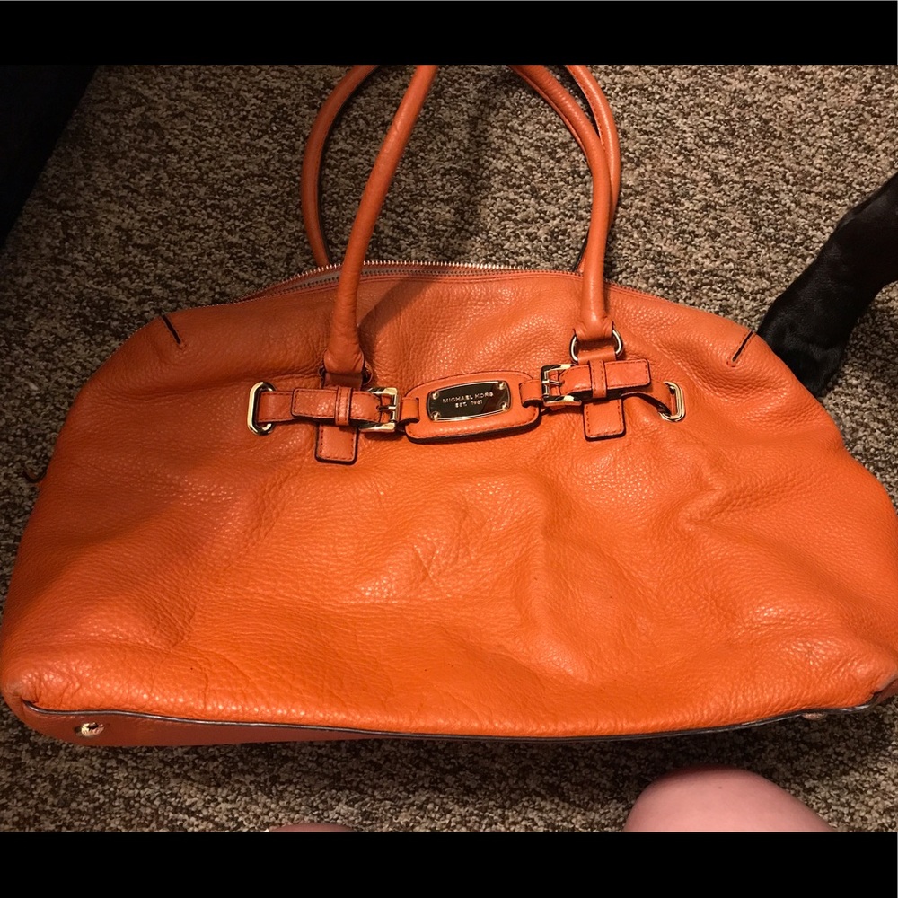 Orange Michael Kors overnight bag