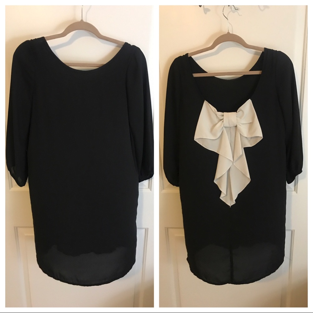 Black dress with white bow on back
