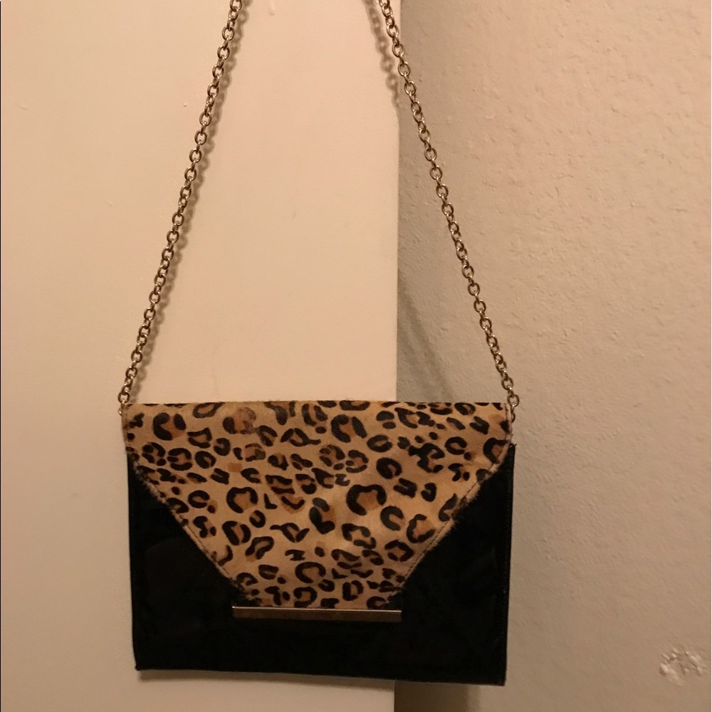 Cheetah fold over clutch style with gold chain