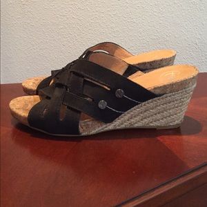 Black suede wedge sandals by Nurture