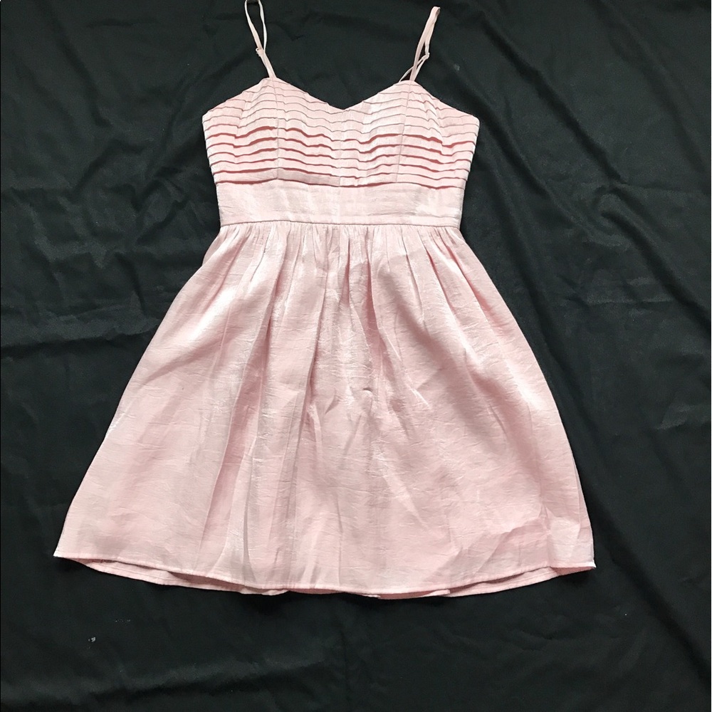 Pastel pink baby doll dress.