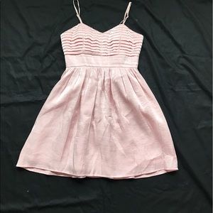 Pastel pink baby doll dress.