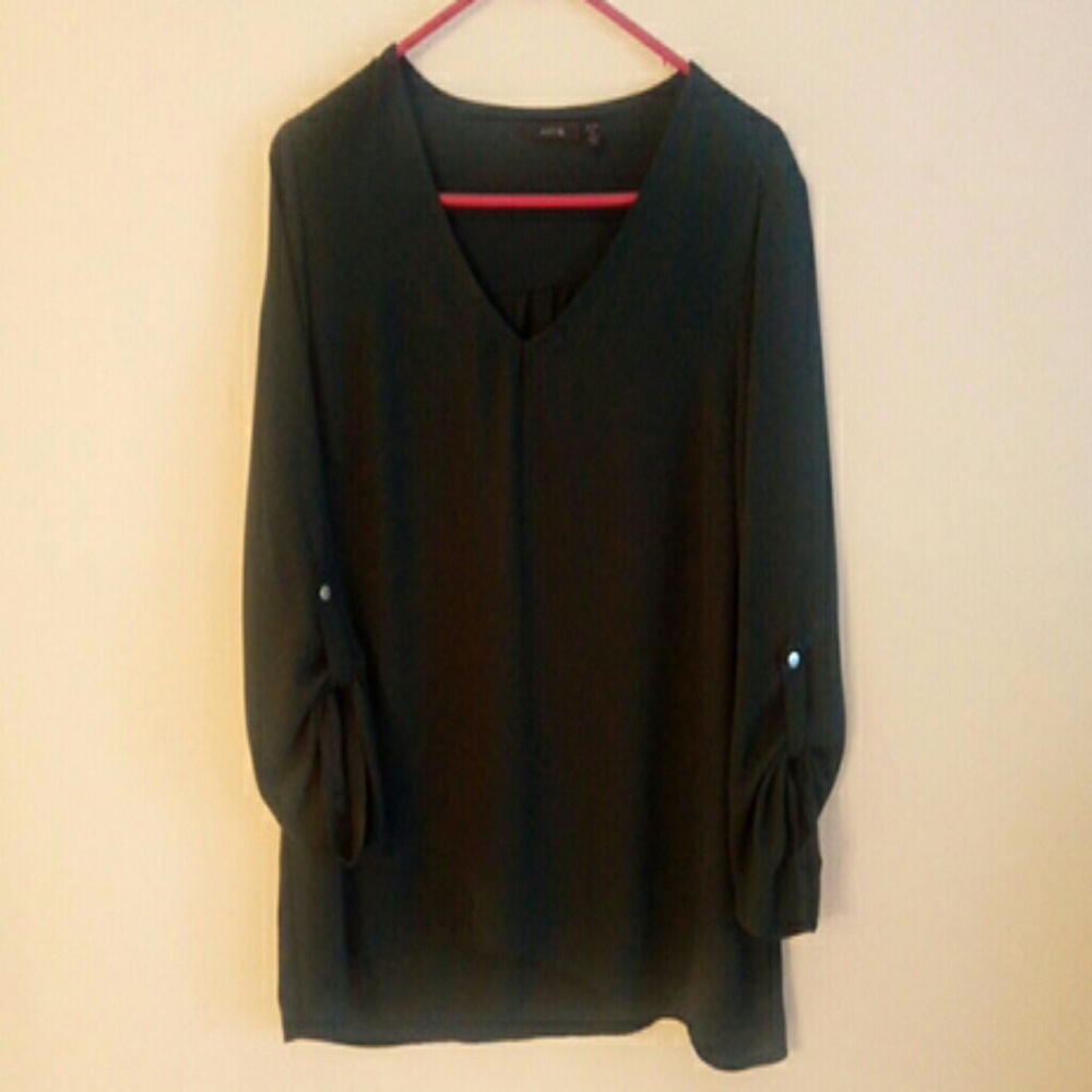 V neck dark green blouse.