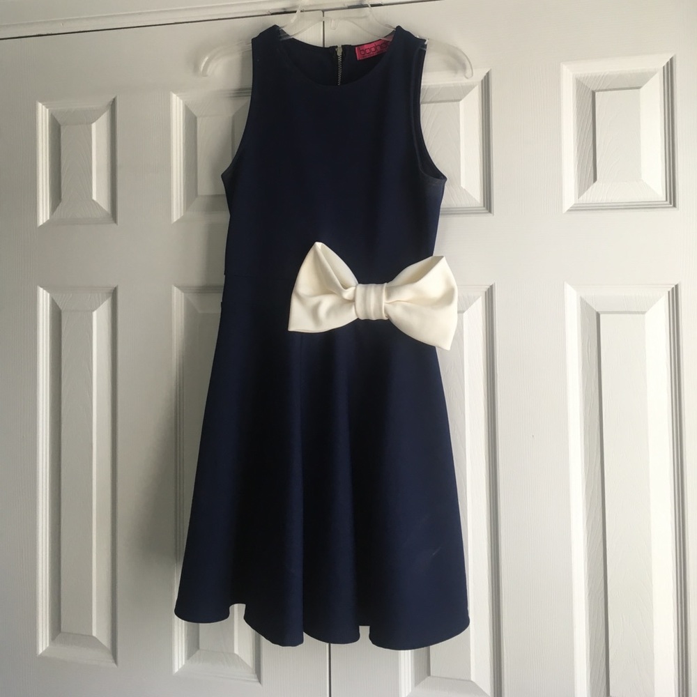 Navy skater dress with white bow