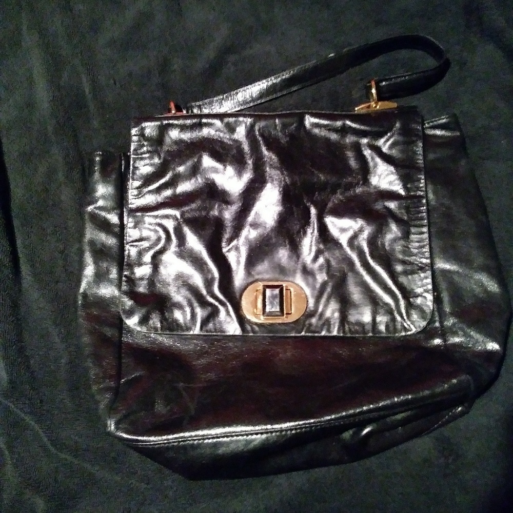 Black leather larger shoulder bag.