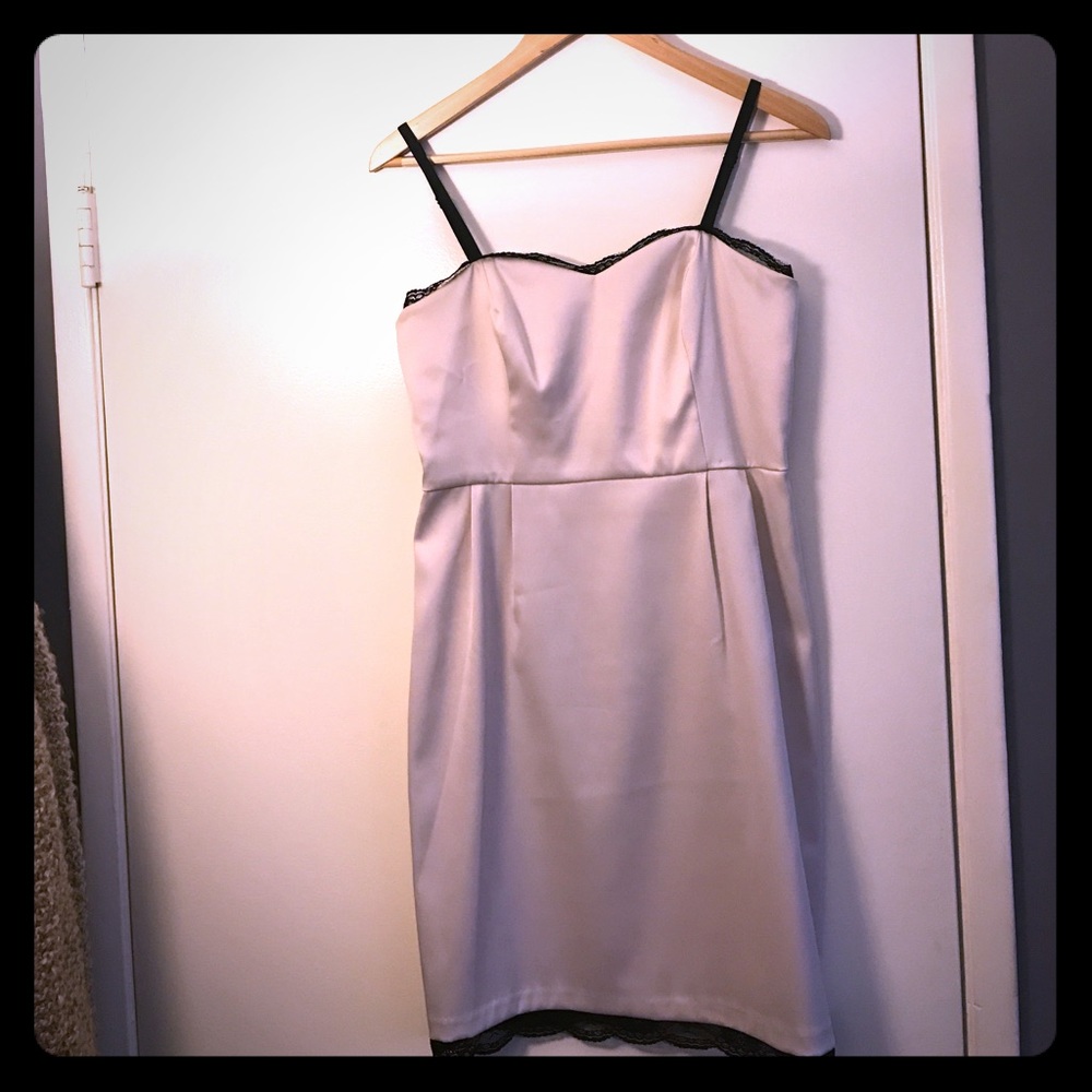 Cream dress with black lace trim