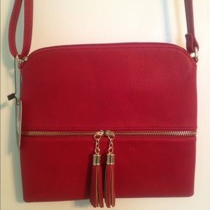 Brand new-Red faux leather handbag.
