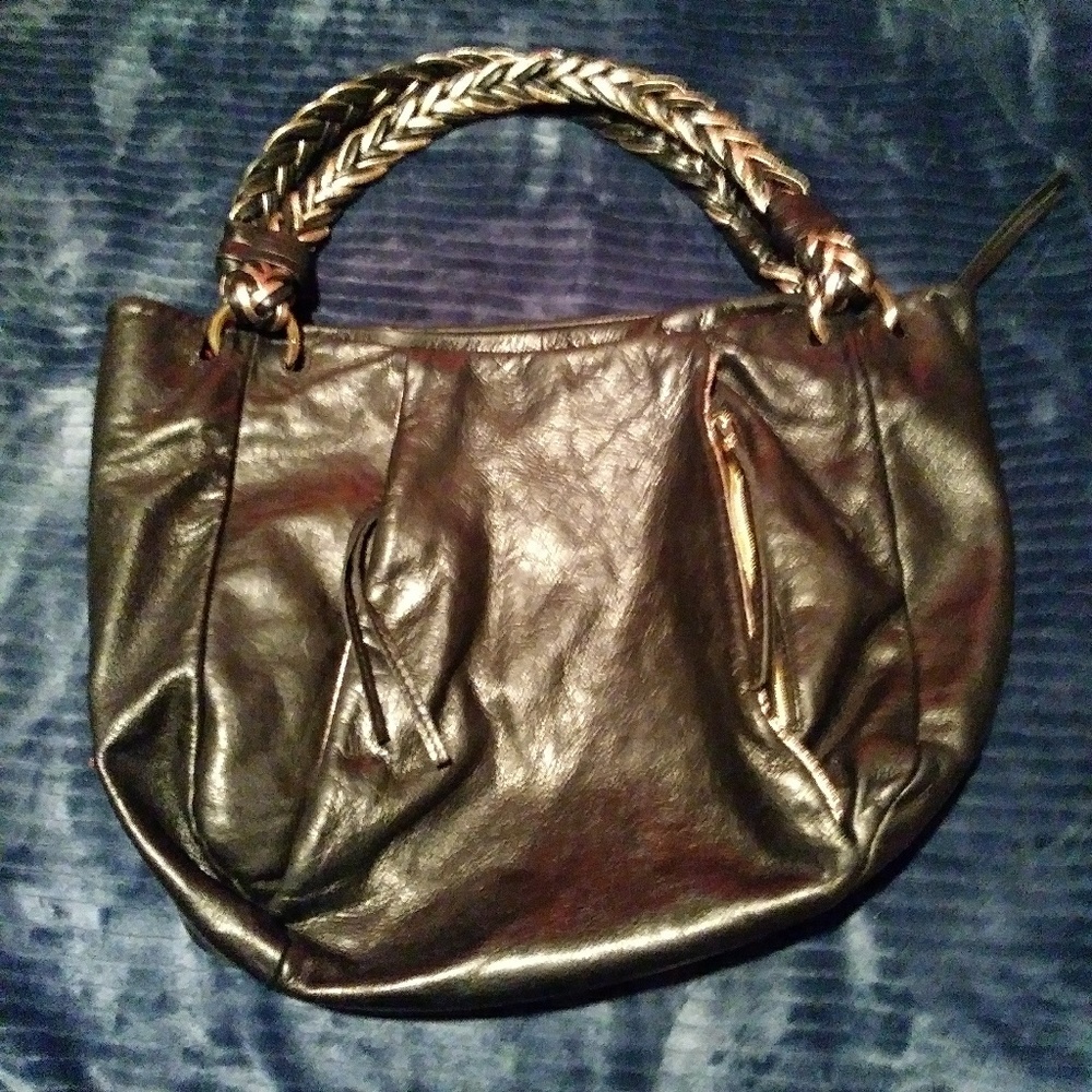 Large black and gold purse.