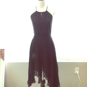 ANGL halter dress. Backless with handkerchief hem