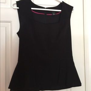Black peplum sleeveless top