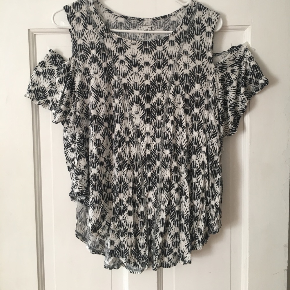 Free people float off the shoulder top
