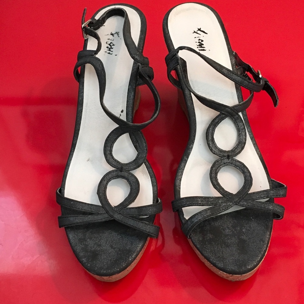 Size 10 Cork wedge sling back with strap.