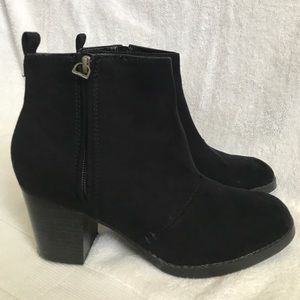 Black booties with brass zipper