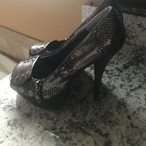 Never been worn skull pumps! Size 9