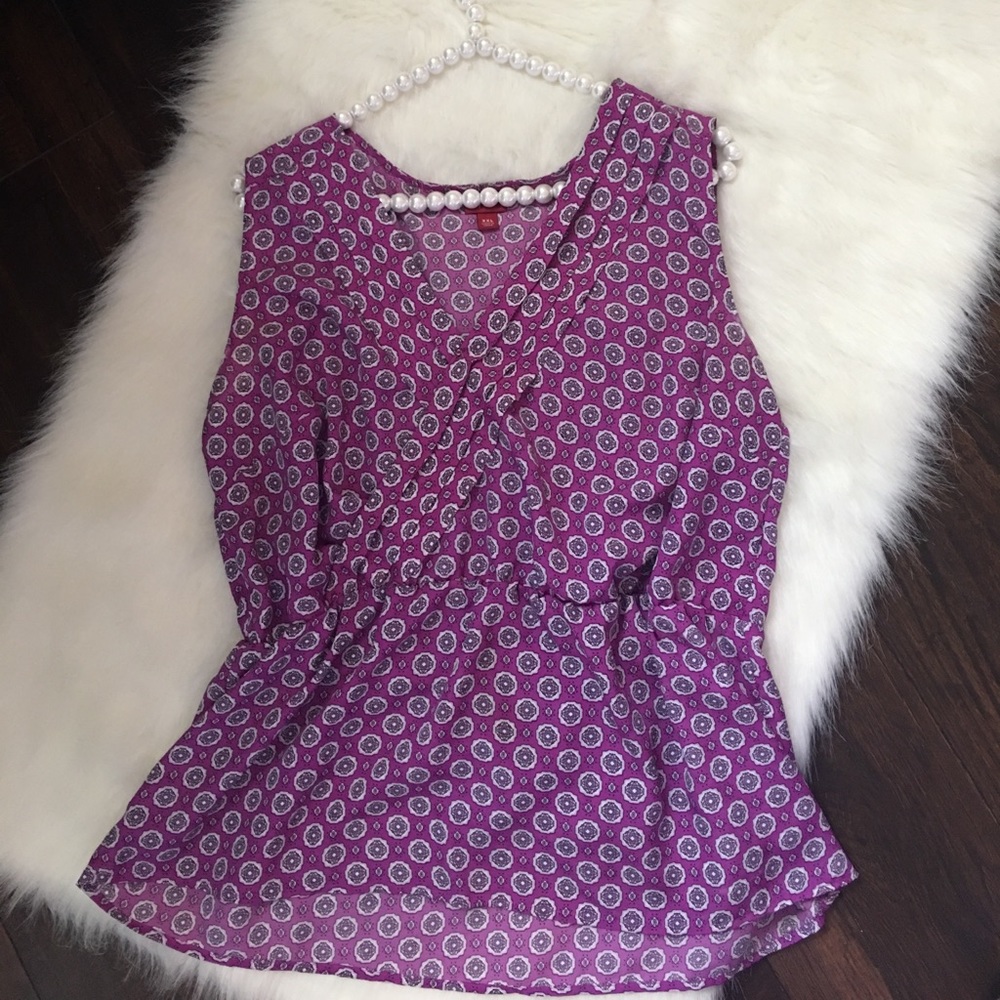 Marina faux wrap peplum sleeveless blouse