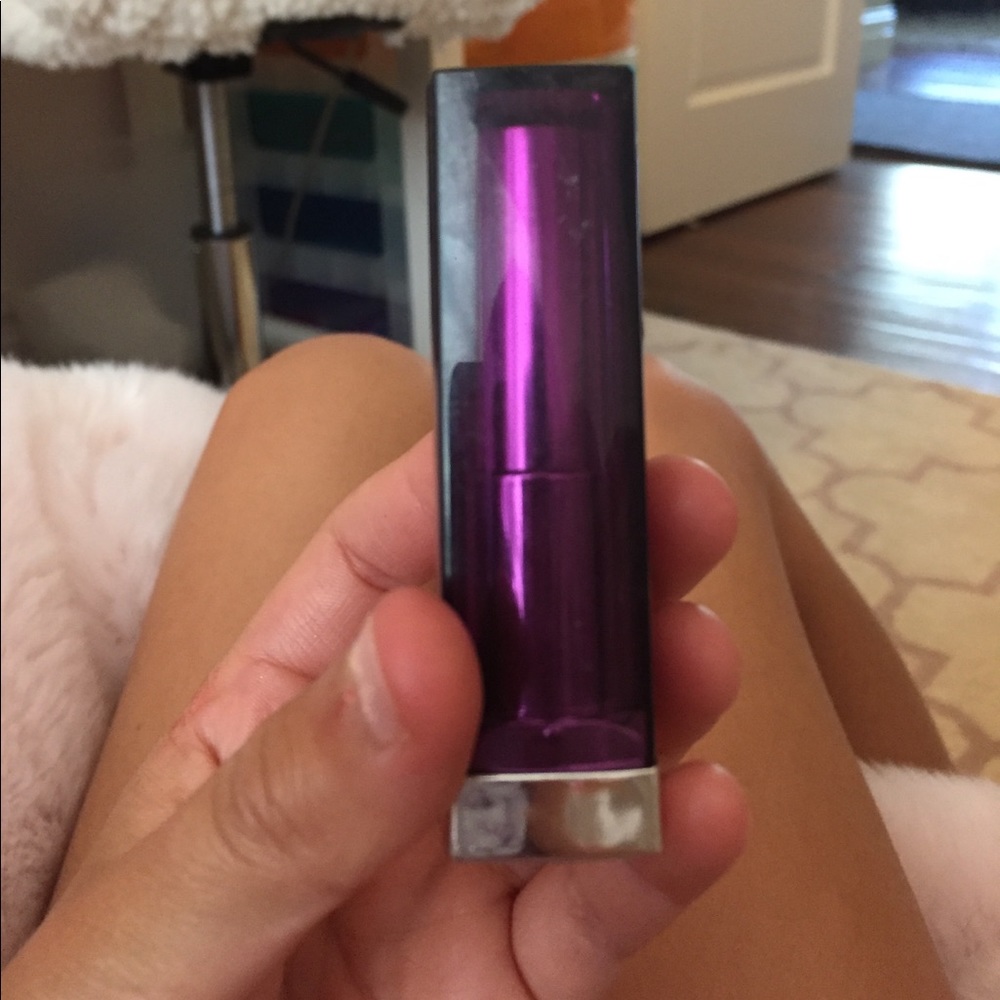 I'm selling a dark purple lipstick