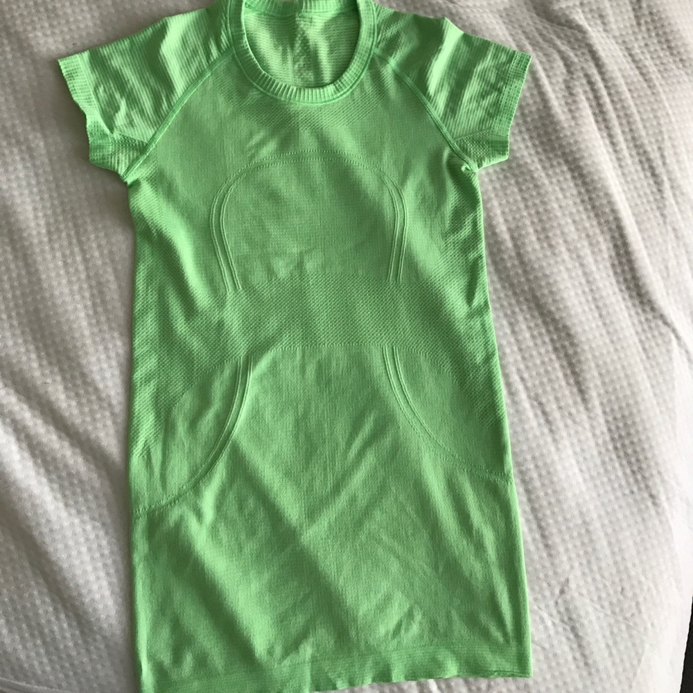 Perfect condition run swiftly short sleeve size 4