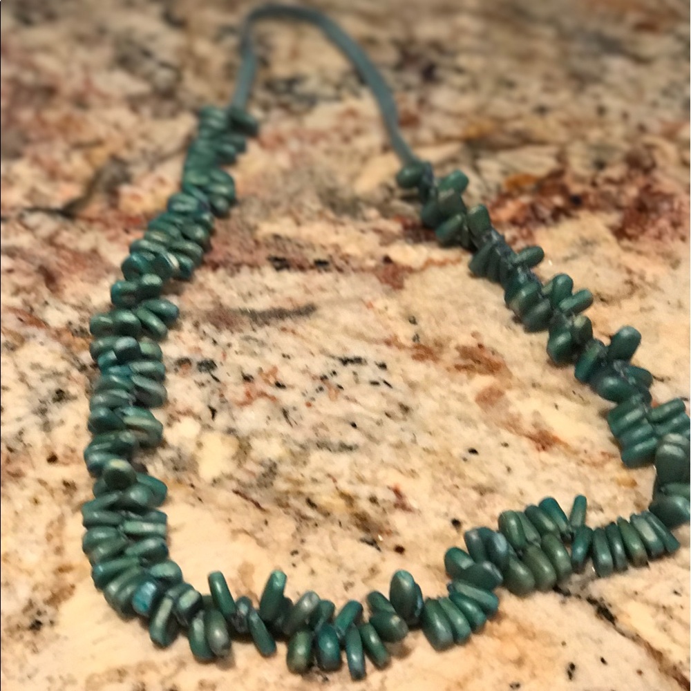 turquoise necklace.