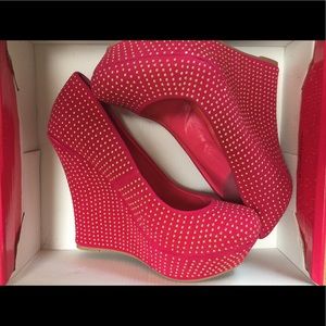 Bright fushia, closed toe wedges.