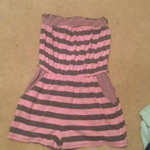 pink and grey romper . has one stain.