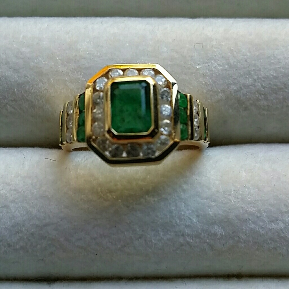 Emerald and diamond bezel channel set ring