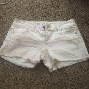Distressed white AEO jean shorts