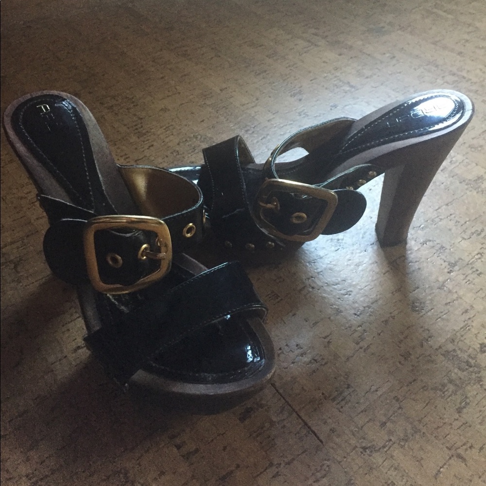 Arden B black and gold heels.