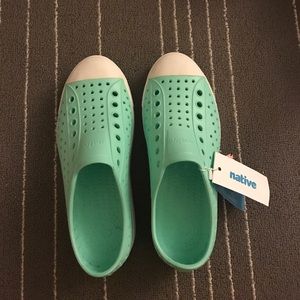 BRAND NEW rubber sneakers