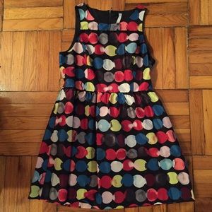 Black dress with colored polka dots.