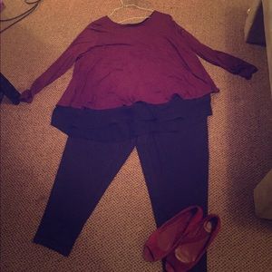 Burgundy blouse with sheer black lining.