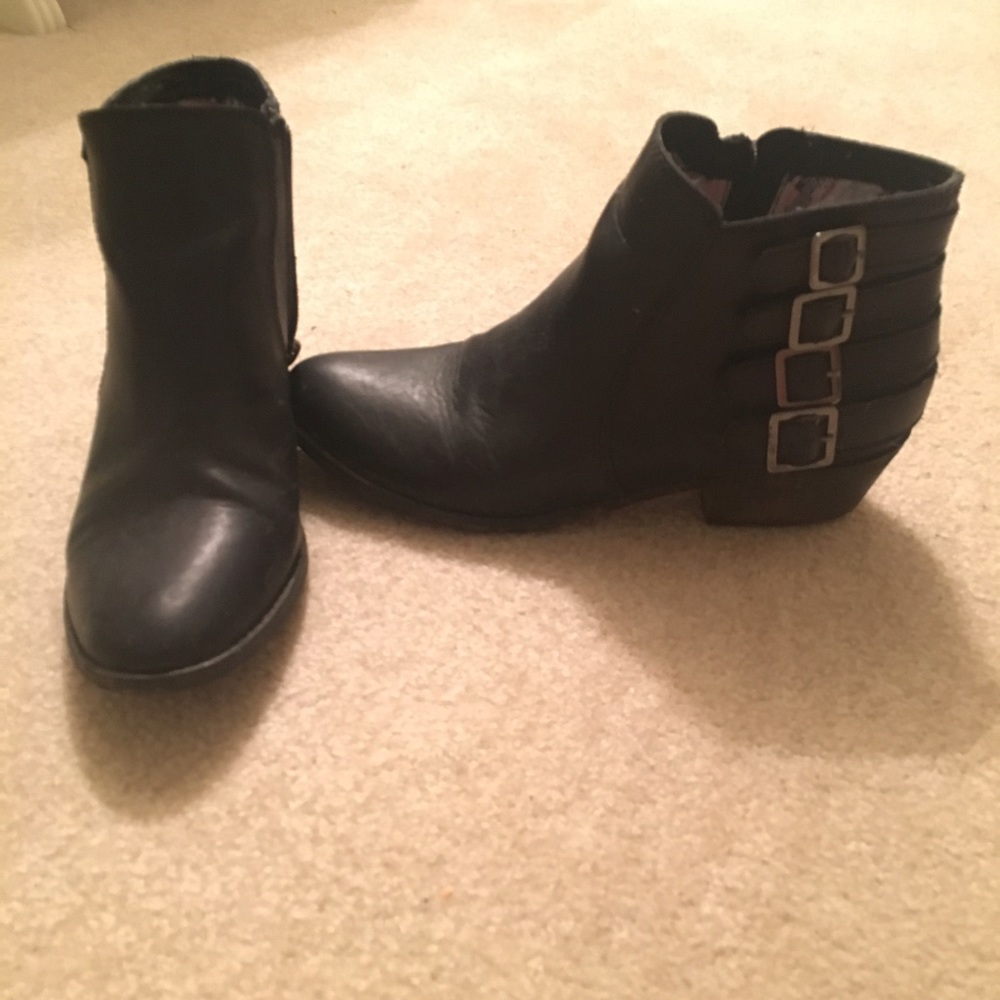 Black ankle boots with silver hardware