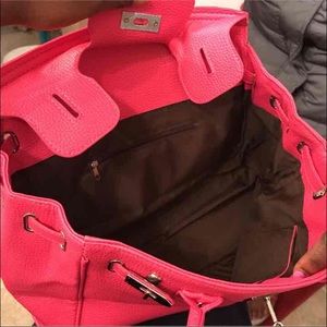 Hot pink purse with key lock