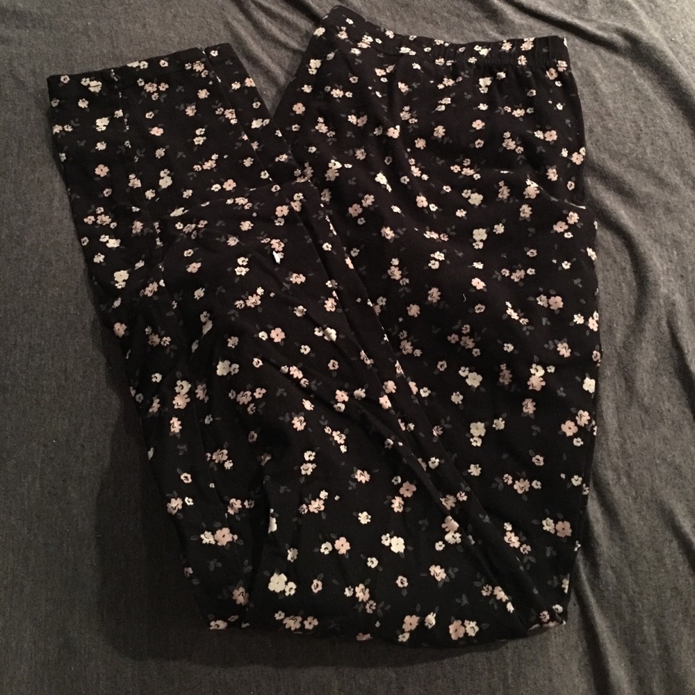 Torrid black leggings with pink and white flowers