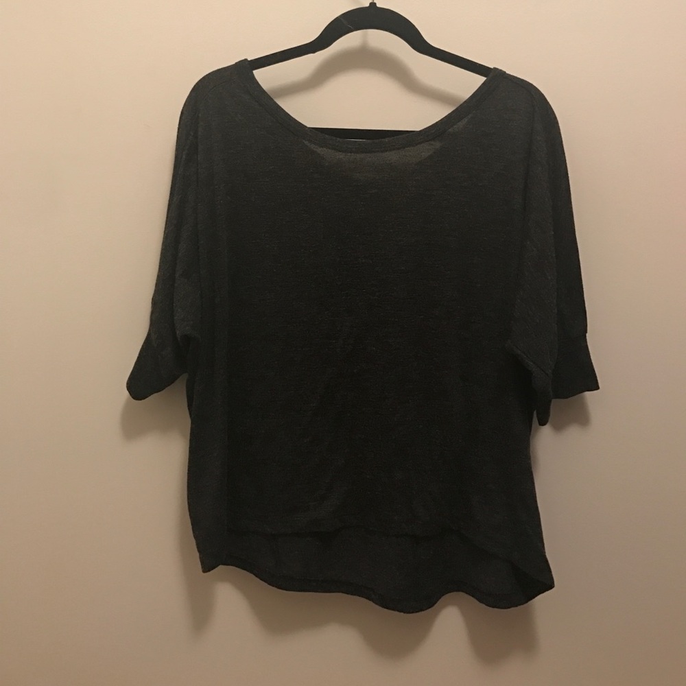 Black flowey shirt with a buttoned up back