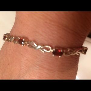 Garnet and Sterling silver bow tennis bracelet