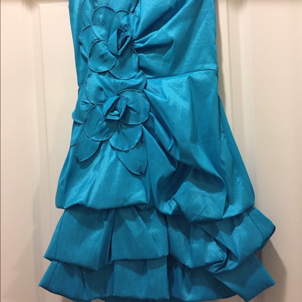 Special occasion Blue dress with ruching.