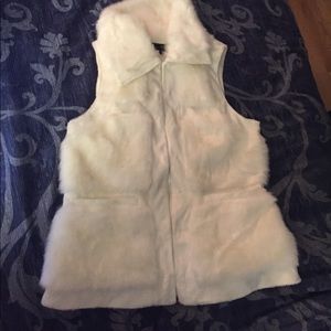 A white fur vest