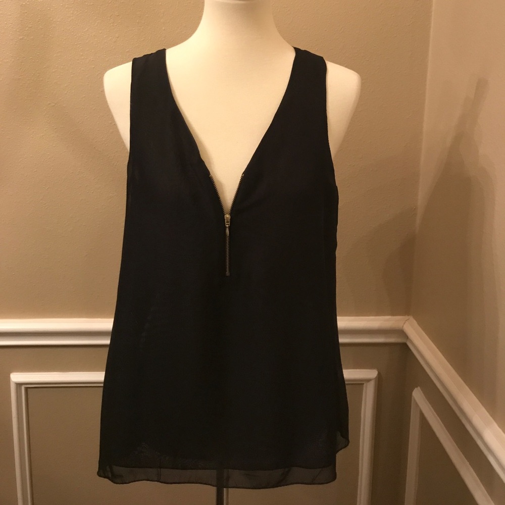 Zip up sleeveless.