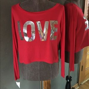 NWT Red long sleeved cropped LOVE ❤️ Shirt NWT Red long sleeved cropped LOVE ❤️ Shirt
