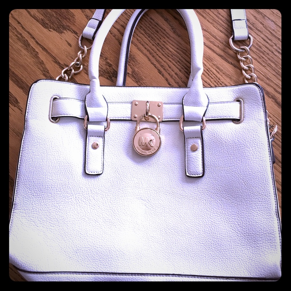 White faux MK purse with gold chain strap