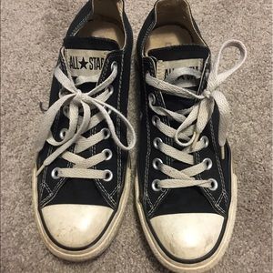 Black low top converse sneakers
