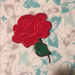 Red rose embroidered patch