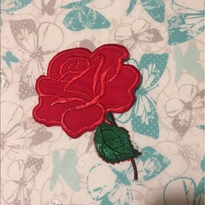 Red rose embroidered patch