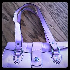 Pink faux Prada purse