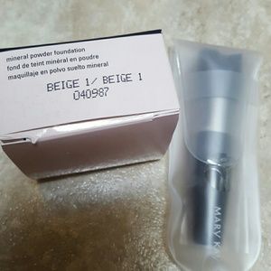 Marky Kay Mineral foundation with brush