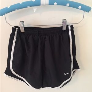 Black Nike running shorts