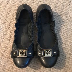 Navy Blue Tory Burch flats with gold hardware