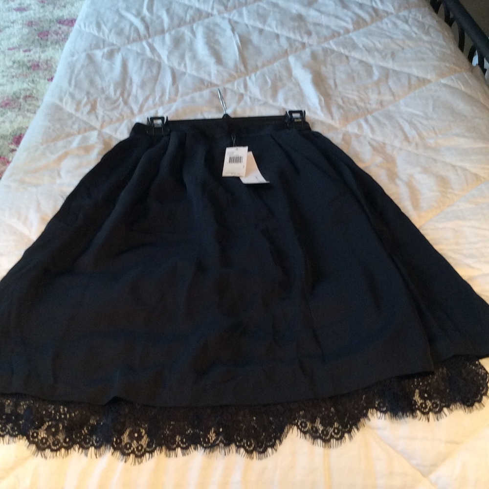 Black silk like skirt