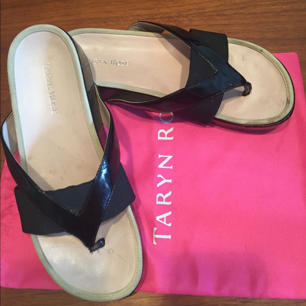 TARYN ROSE BLACK PATENT SANDALS. Pink shoe bag.