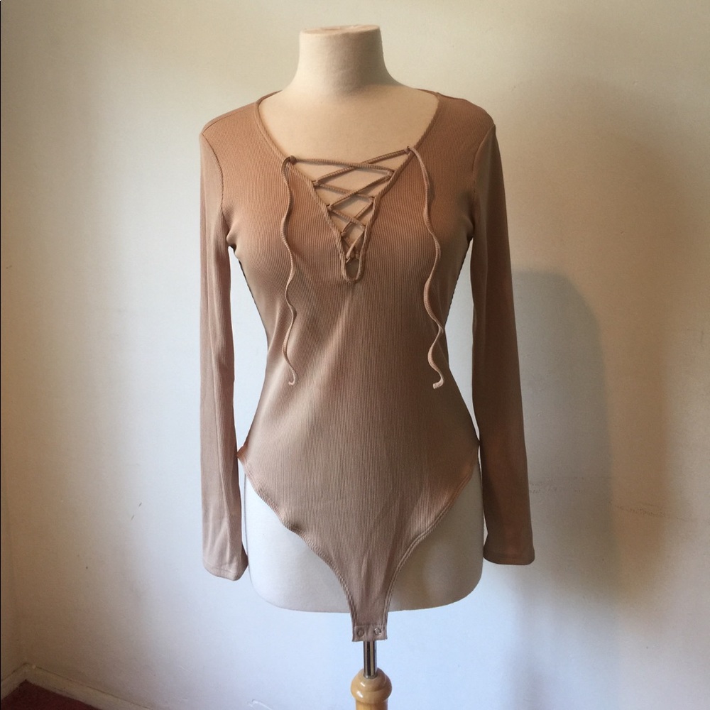 Forever 21 tan lace up body suit NWT